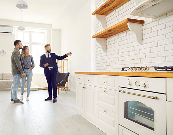 Image showing buyers in a kitchen with an estate agent