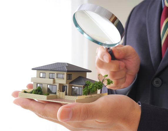 Image showing a close up of Businessman Evaluating Real Estate